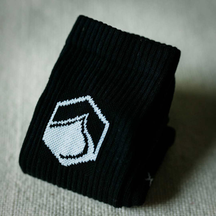 LF x Stinky Crew Socks: Black with a white geometric design.