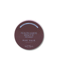 A round tin of NAK HAIR Niacinamide Rescue Hair Masque in a dusty mauve-brown shade, shown on a clean white background.