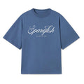 A blue Micah Palace Max Heavyweight short-sleeve tee featuring "Spanglish" in bold white script and "PALMOQ. EST. 2001" in smaller print on the front.