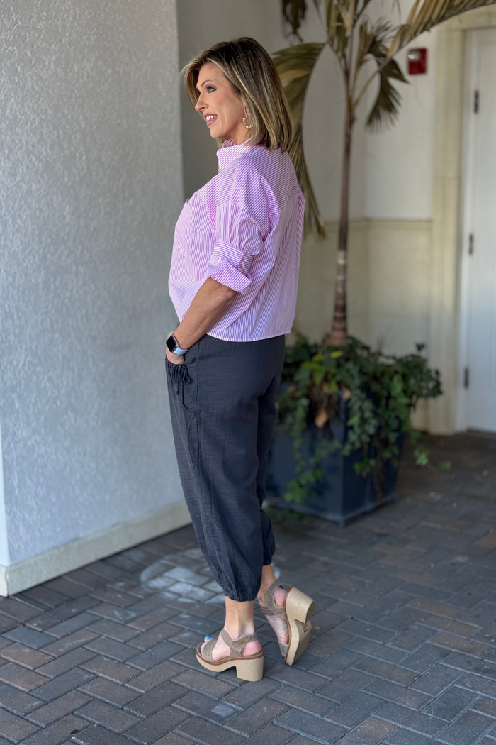 Side view of voluminous cropped gray pants