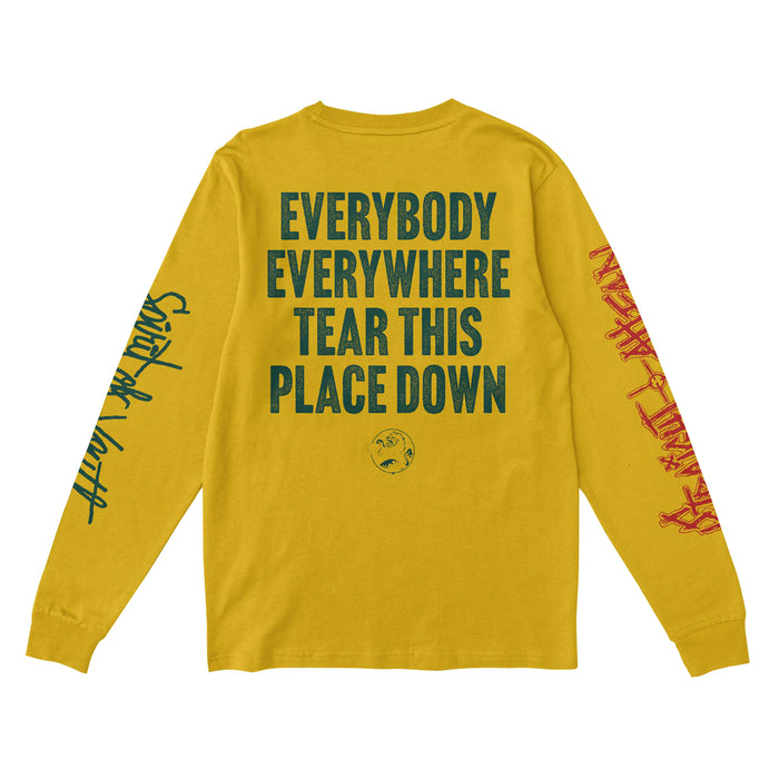 Straight Ahead yellow long-sleeve Comfort Colors shirt with bold black text "EVERYBODY EVERYWHERE TEAR THIS PLACE DOWN" on the back. Left sleeve features black cursive; right sleeve has red graffiti-style text. Presale available now.