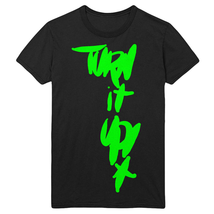 A black Orange 9mm cotton t-shirt features bold, bright green graffiti-style "Turn it up" text printed vertically down the front—a standout piece among printed garments.